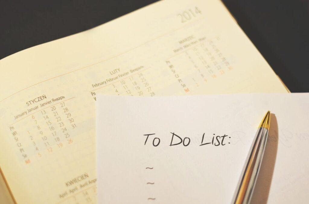 College student creating a budget by listing income and monthly expenses