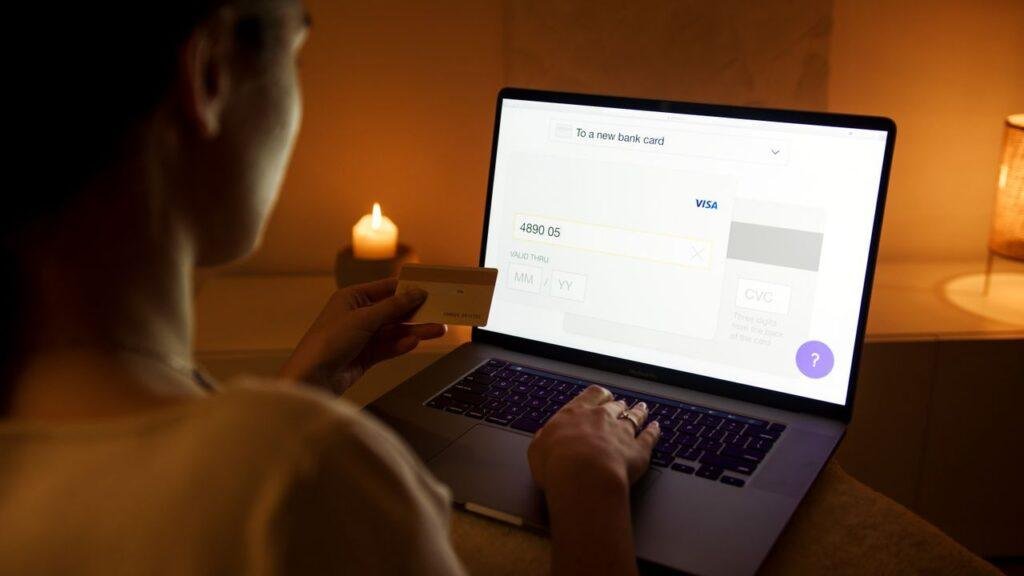 Student setting up online banking and following security steps